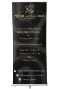 Mockup des von Benny's Grafikstudio erstellten Rollup-Banners für Afghan Gems & Jewels, entwickelt von Ihrer Grafikdesign-Agentur in der Ortenau.
